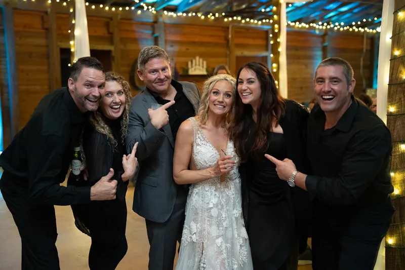 Hamilton and Michelle celebrating with friends at Kelly Farm Events