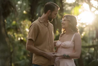 Couple at gazebo reflecting pond at Washington Oaks Gardens