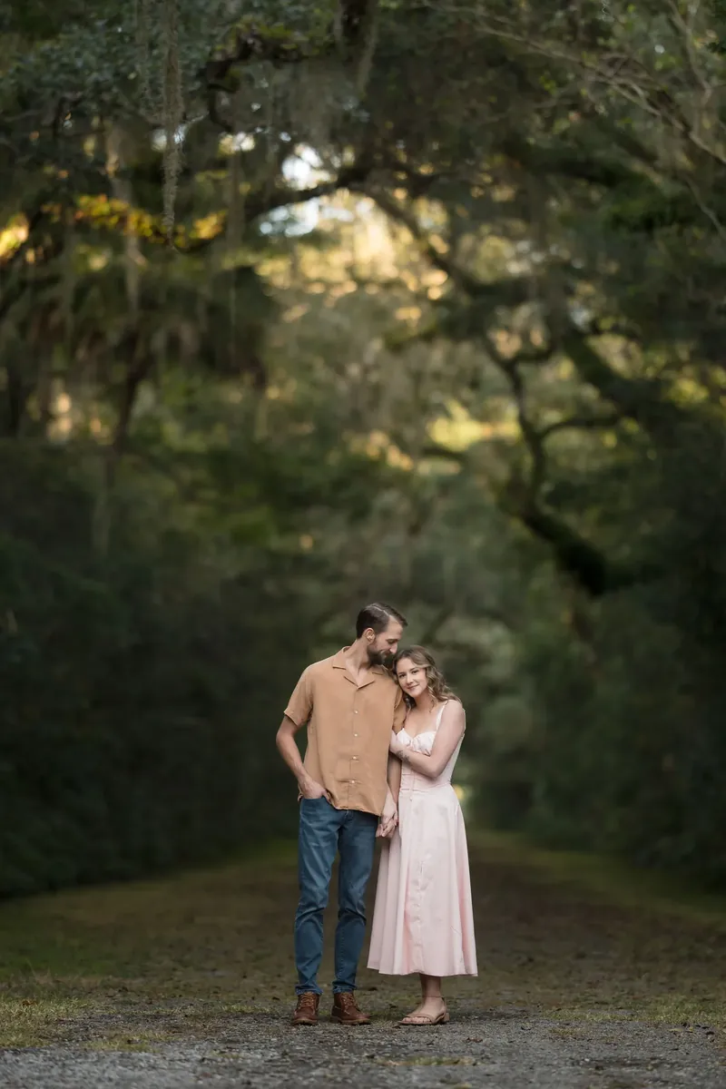 Helen and Saje portrait under the oak canopy at Washington Oaks