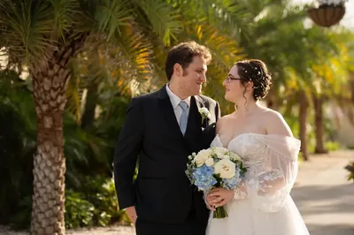 Couple portrait among palm trees in St. Augustine