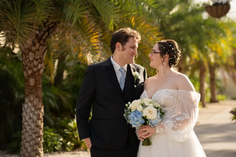 Couple portrait among palm trees in St. Augustine