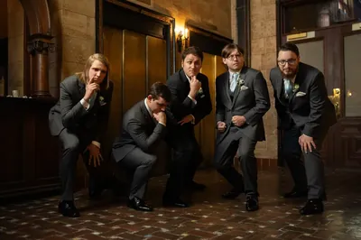 Groomsmen fun posed photo at Treasury on the Plaza