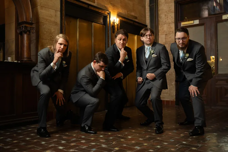 Groomsmen fun posed photo at Treasury on the Plaza