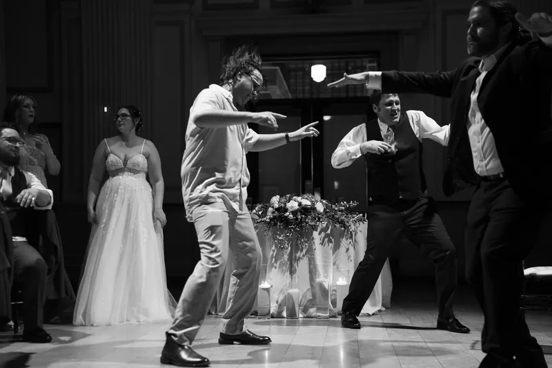 Groomsmen dancing at Treasury wedding reception