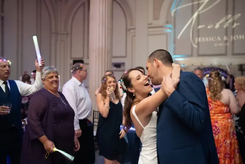 Bride and groom dancing joyfully