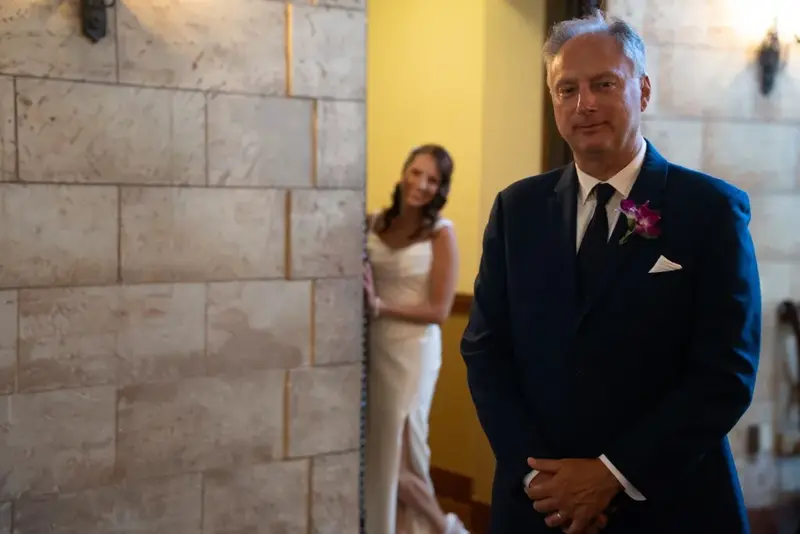 Bride approaches man in suit