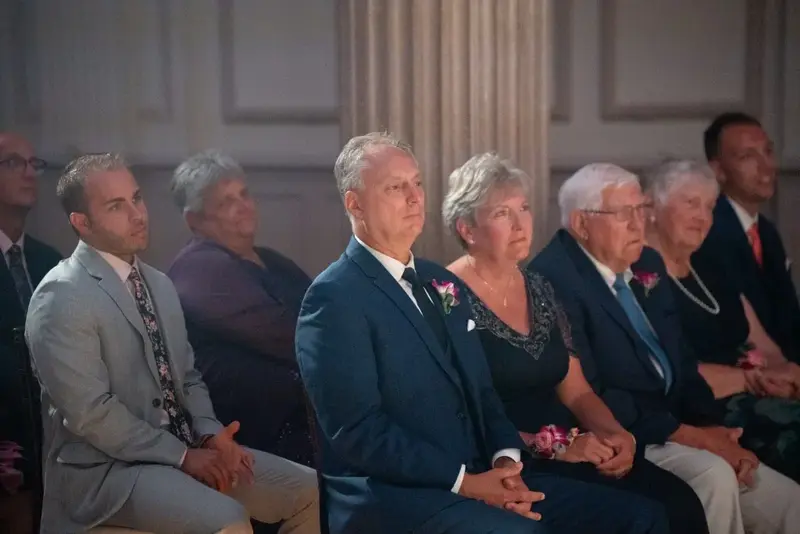Guests seated at wedding ceremony