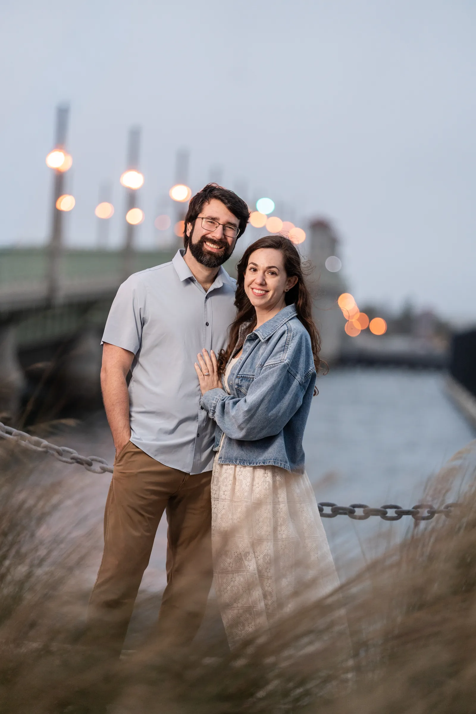 St. Augustine engagement photographer captures couple at Bridge of Lions at dusk
