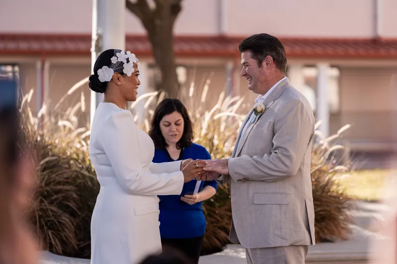 Josh and Diane exchange rings during their courthouse ceremony