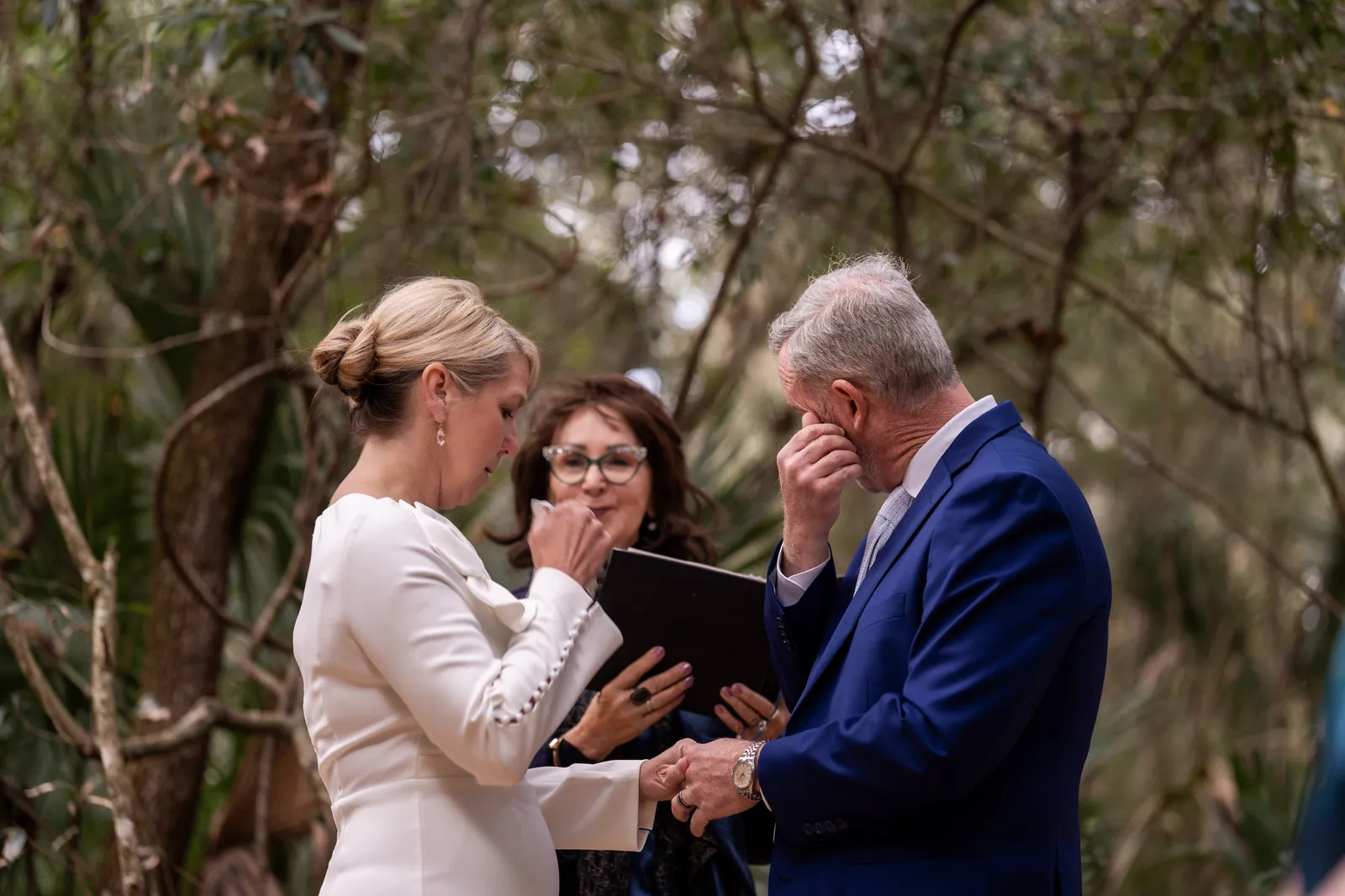 Emotional ceremony moment with officiant