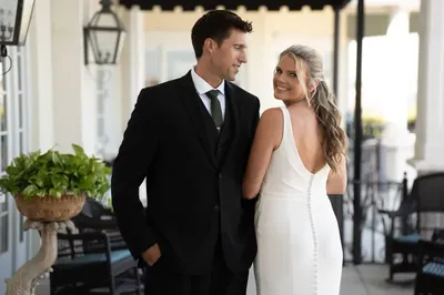 Bride and groom portrait on the veranda at River House
