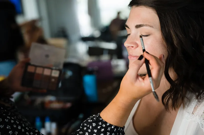 Laurel has makeup applied during preparations at The White Room, St. Augustine.