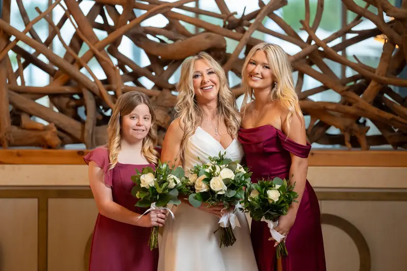 Ceremony in progress with ocean views through floor-to-ceiling windows