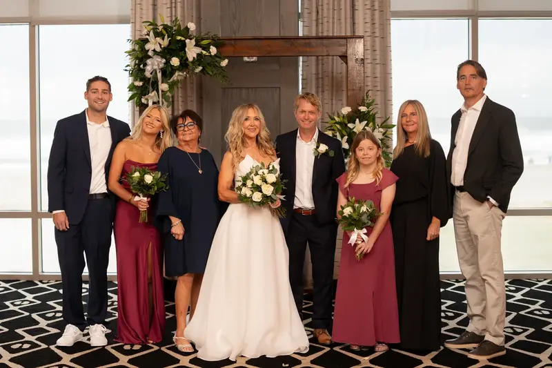 Family group photo with ocean backdrop