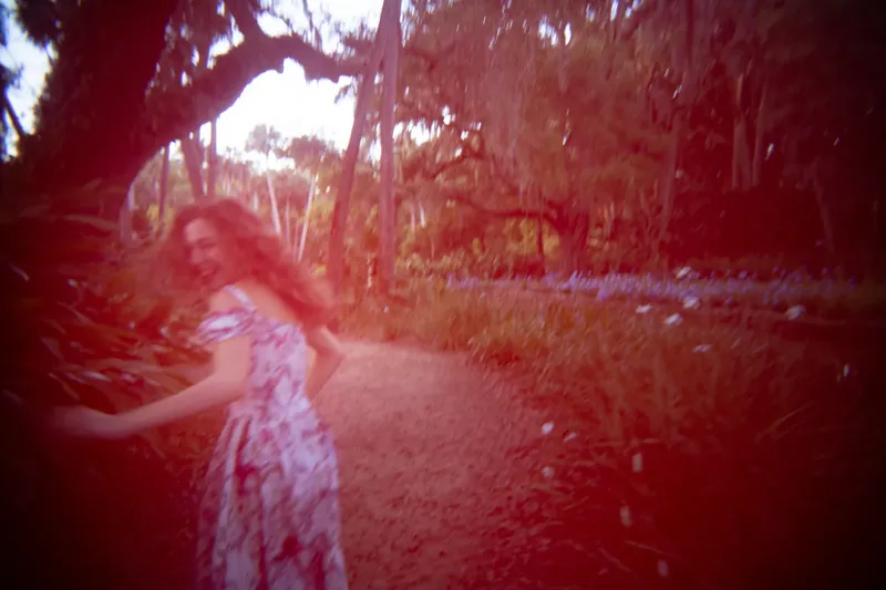 Lydia running with motion blur lo-fi effect