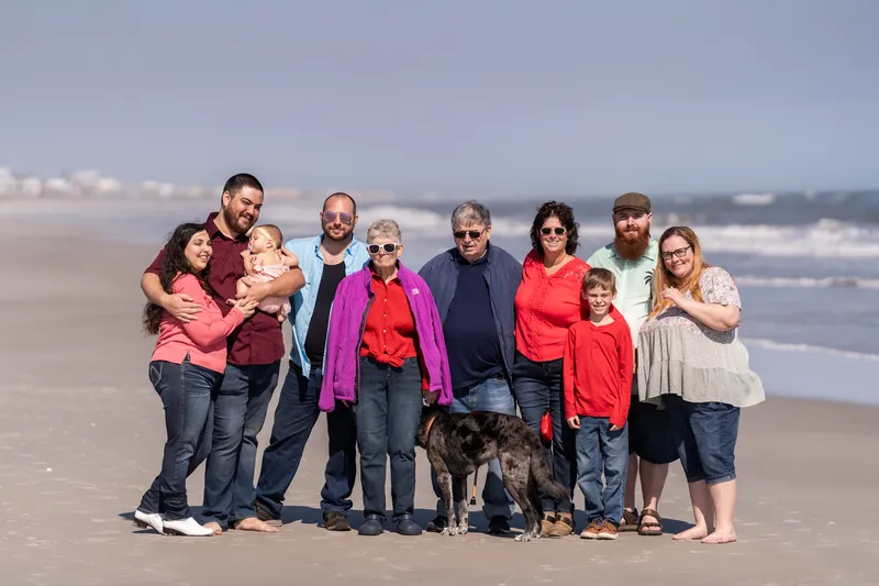 Full family group photo with all four generations and the dog on Vilano Beach