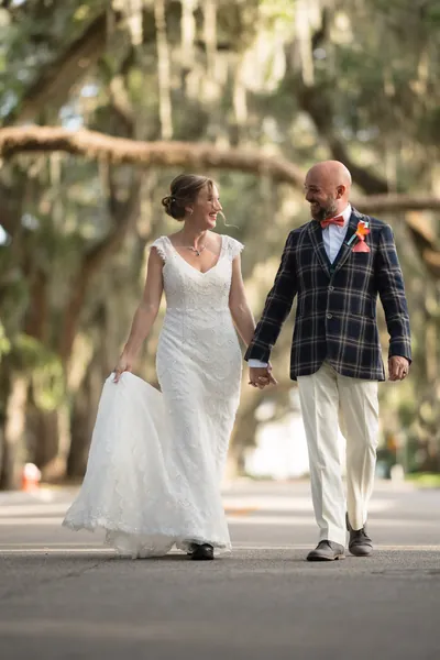 St. Augustine elopement photographer captures couple kissing with the Bridge of Lions in the background