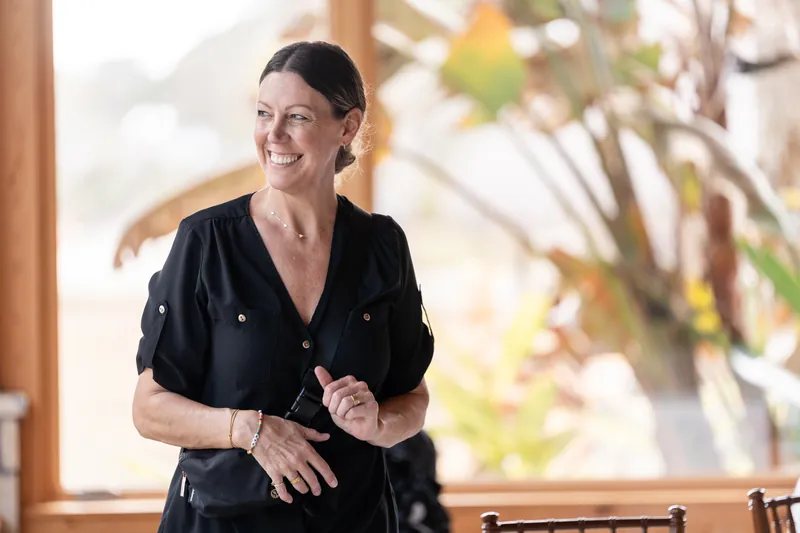 Wedding coordinator smiling during preparations