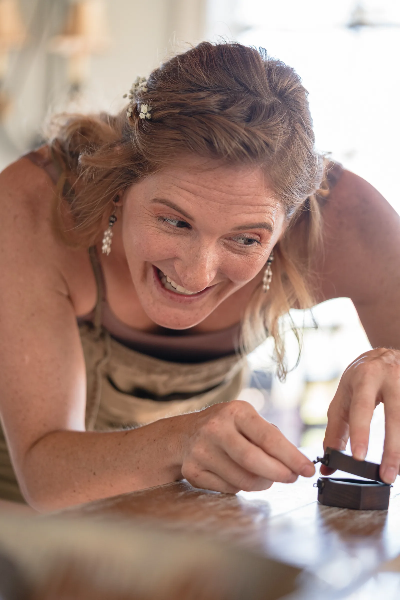Sapphire engagement ring with diamond halo detail shot