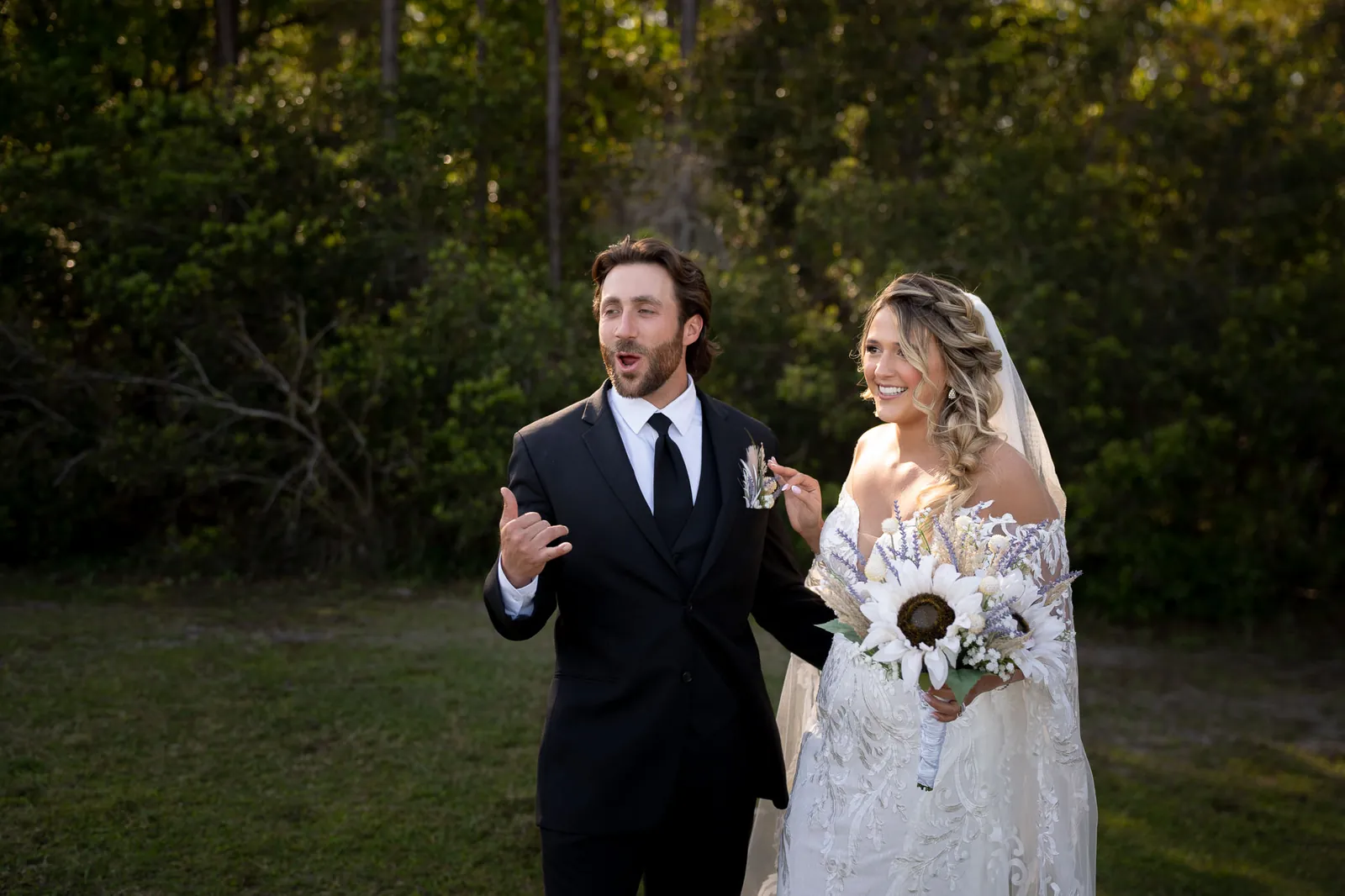 Riley and Robert candid moment laughing together at Tringali Barn