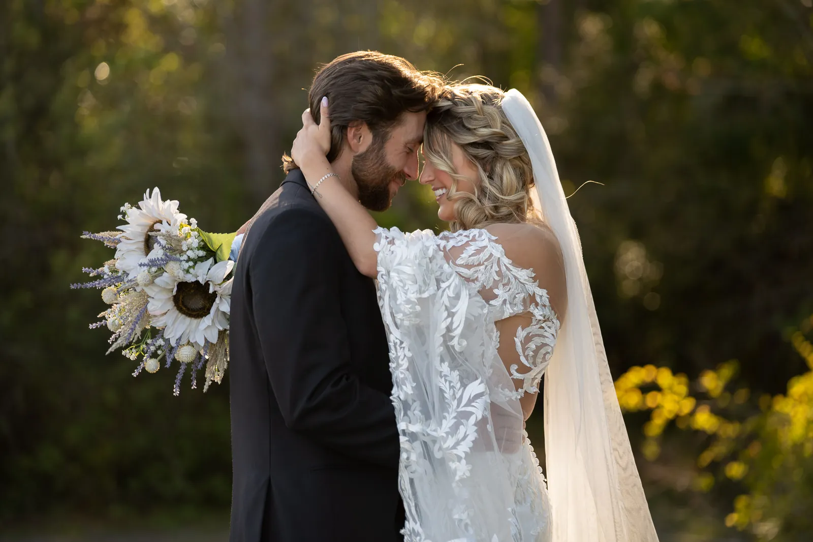 Riley and Robert intimate portrait foreheads touching at Tringali Barn