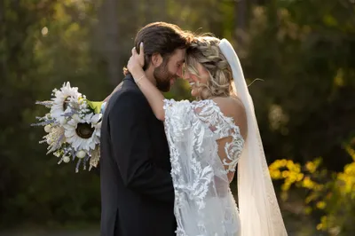Couple intimate portrait at golden hour at Tringali Barn