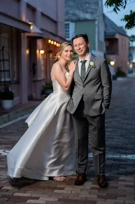 Bride and groom posing at The White Room, St. Augustine wedding photographer captured moment