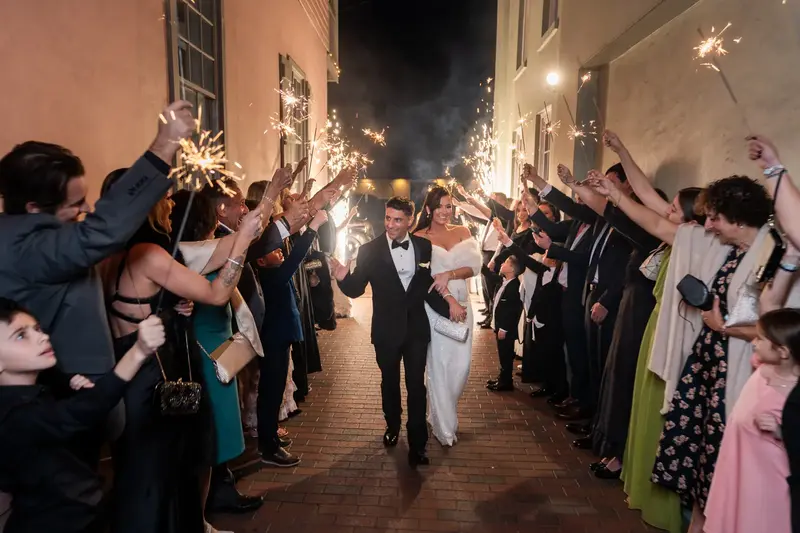 Sparkler exit with guests lining pathway