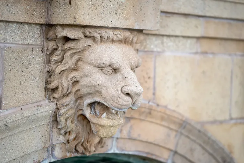 Lion head sculpture architectural detail at Epping Forest Yacht Club