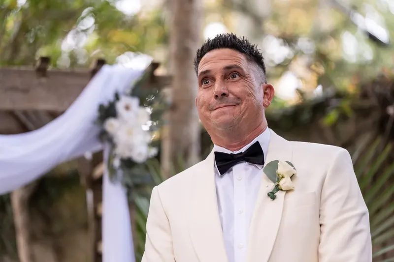 Groom's emotional reaction at altar during St Francis Inn ceremony