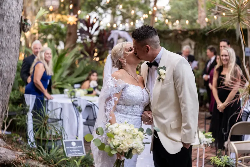 Couple's first kiss at St Francis Inn garden ceremony