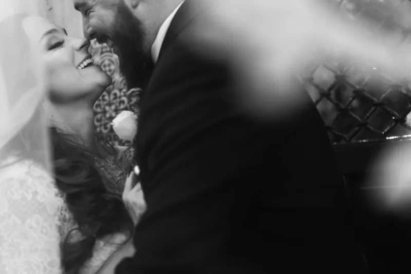 Romantic kiss between bride and groom in St Augustine