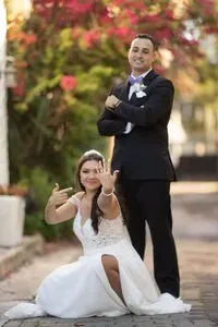 Elopement couple celebrating with rings