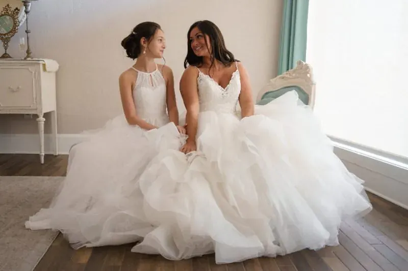 Two brides in wedding dresses at The White Room St Augustine