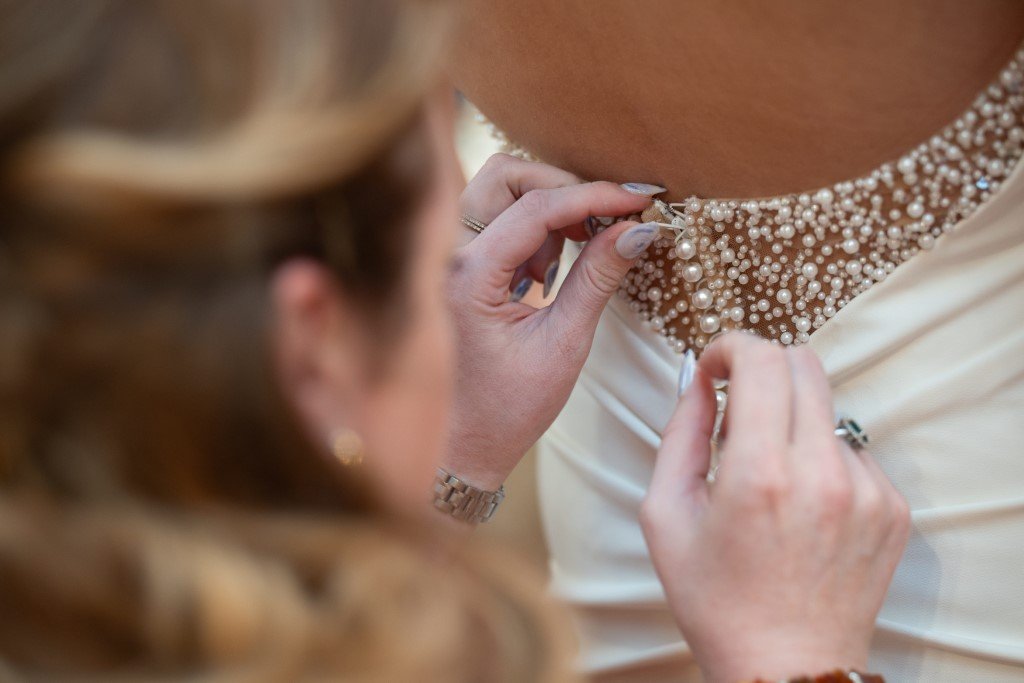 Adjusting the wedding dress details.jpg