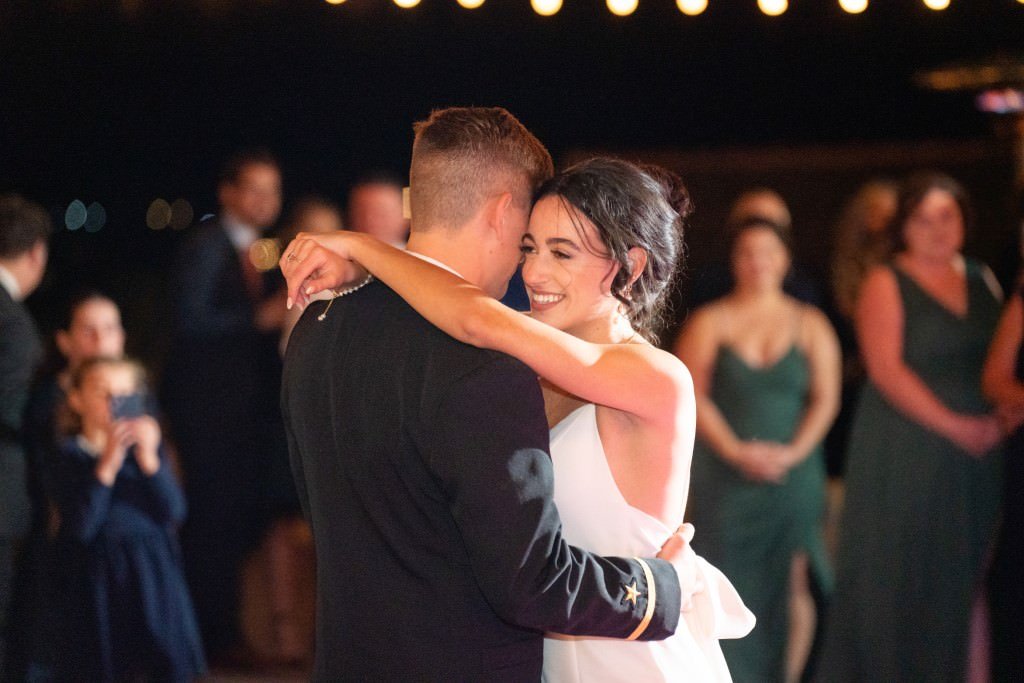 A joyful couple shares a dance at their wedding reception.jpg
