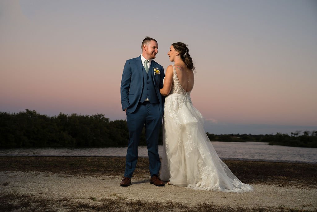 A loving gaze under the sunset sky This is a magical wedding day wedding sunset love.jpg