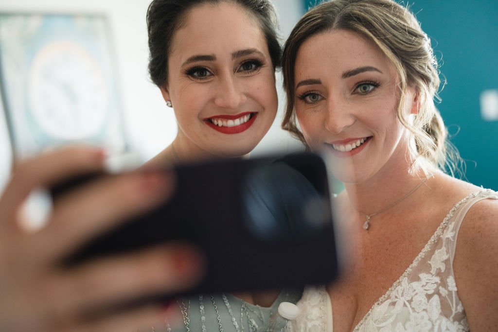 Bride and bridesmaid take a selfie before the ceremony weddingday bridetobe.jpg
