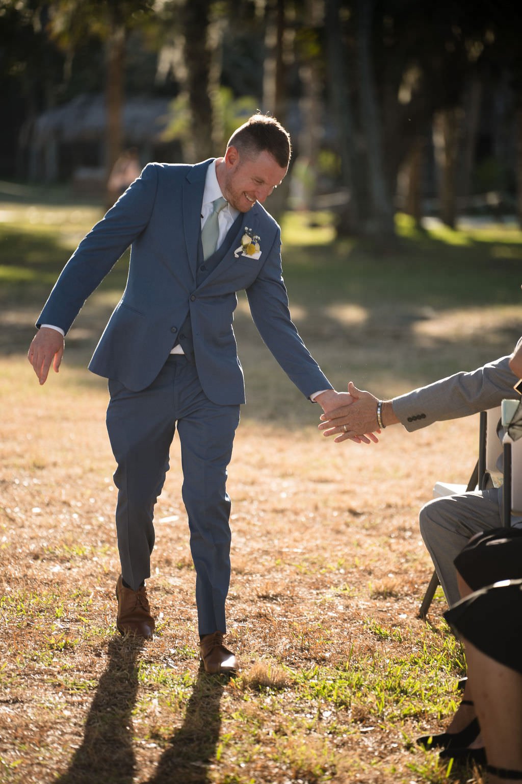 Groom beaming with happiness as he walks down the aisle weddingday groomgoals happilyeverafter.jpg