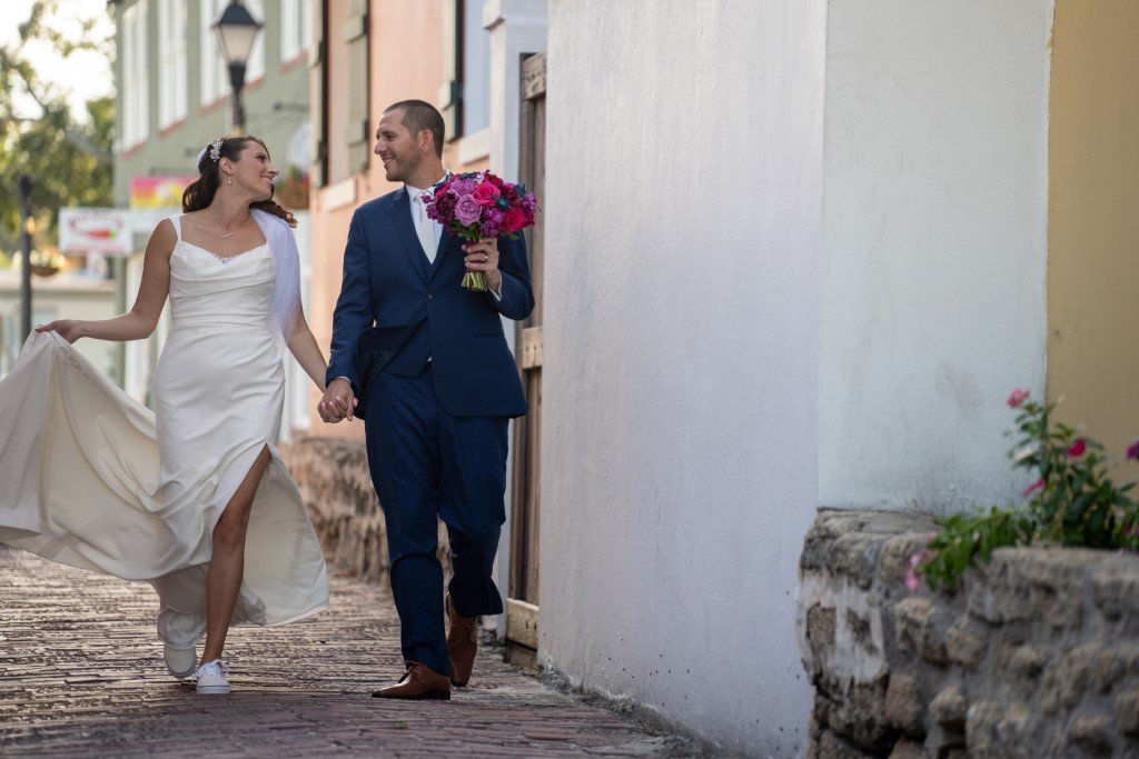 Just married walking hand in hand.jpg