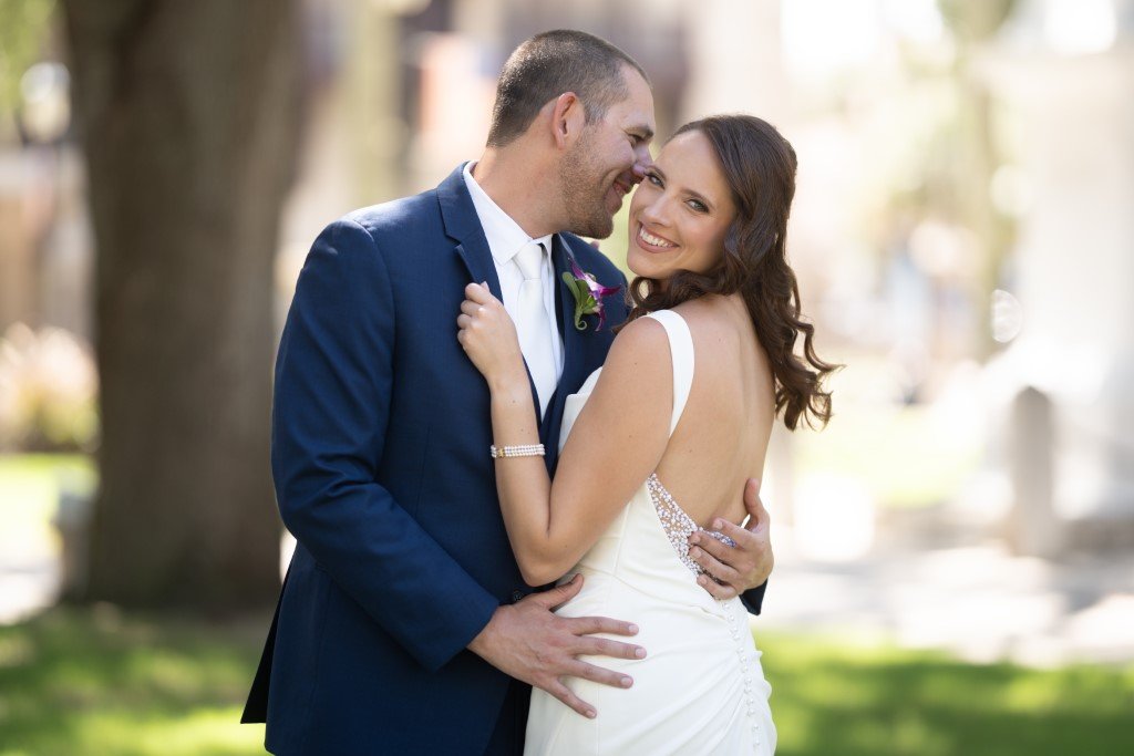 Newlyweds sharing a joyful moment.jpg