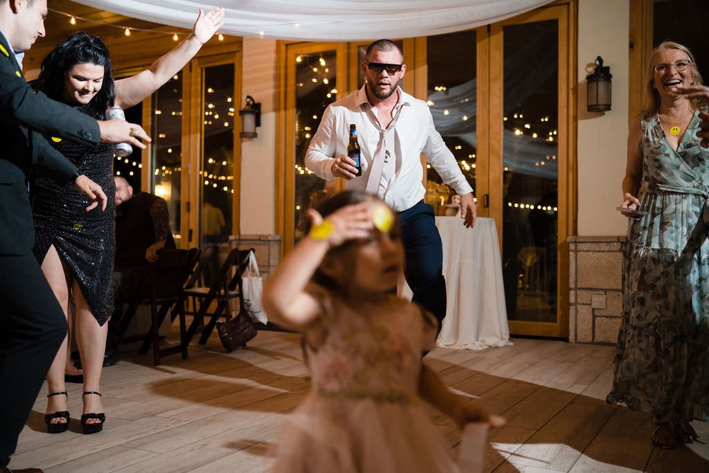 The dance floor is lit with laughter and good times at this wedding reception.jpg