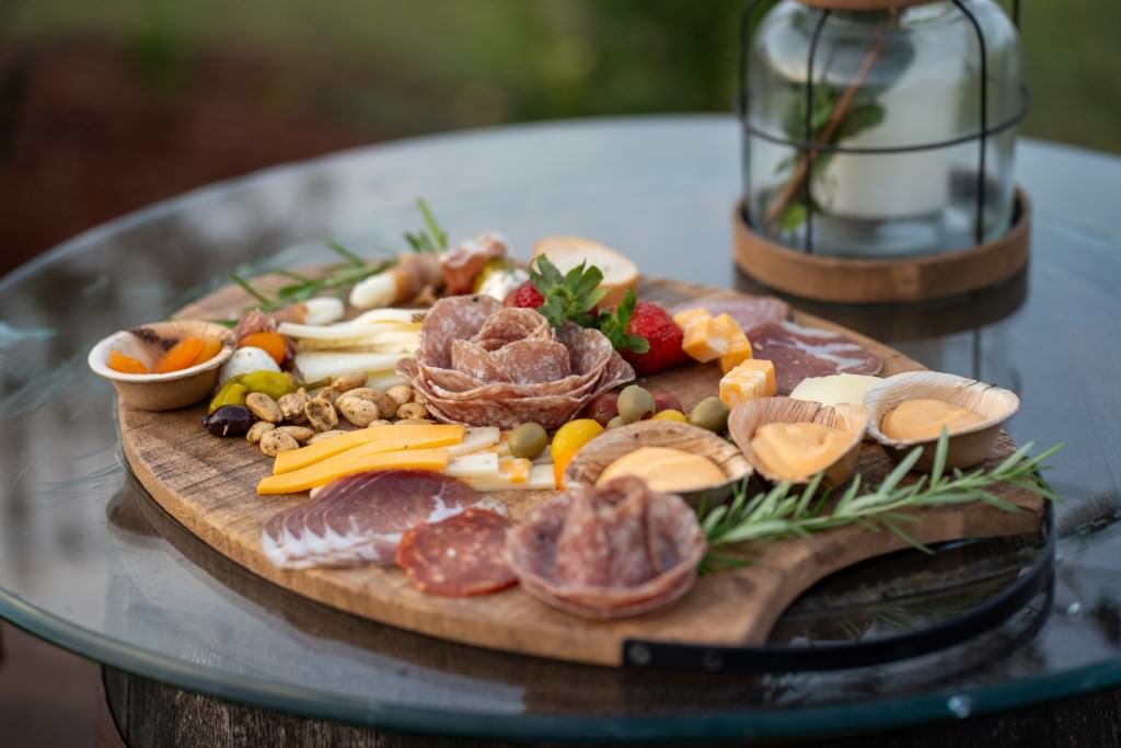 Charcuterie board with assorted treats.jpg