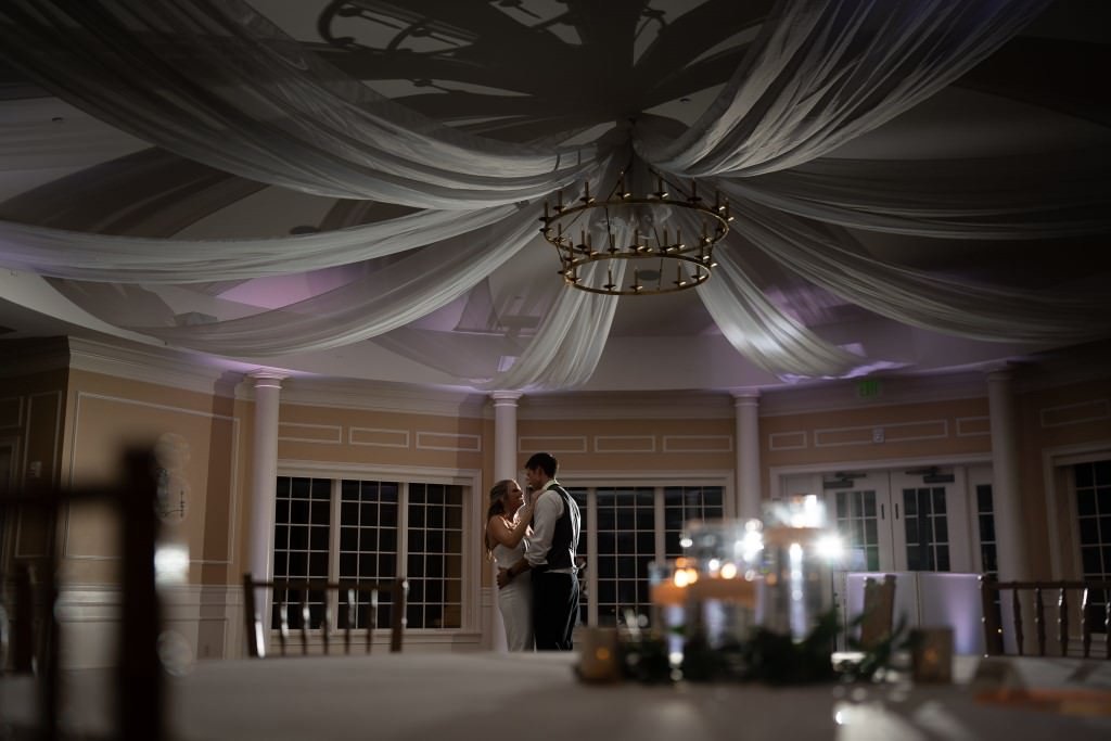Couple dancing under draped ceiling.jpg
