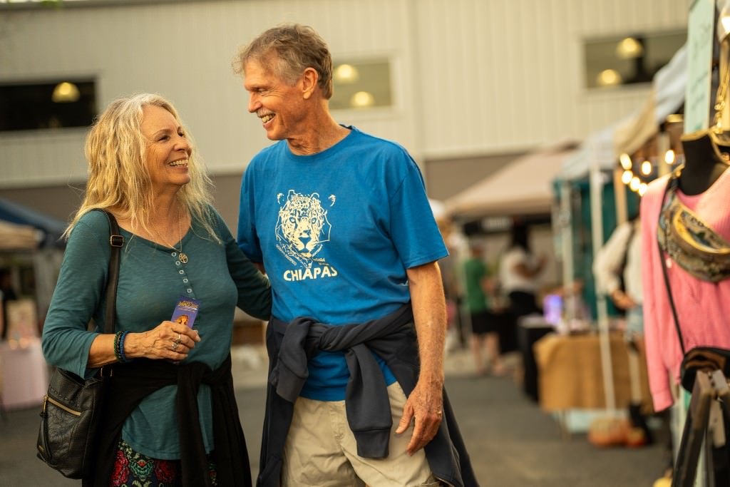 Couple enjoying outdoor market together.jpg
