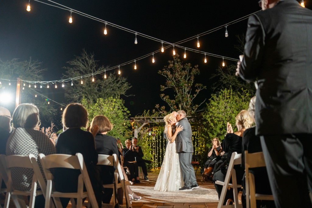 Couple s first kiss at wedding.jpg