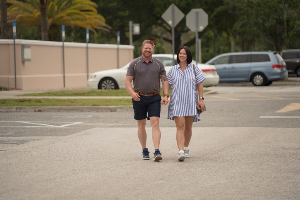 Couple walking in parking lot of st augustine clerk of courts.jpg