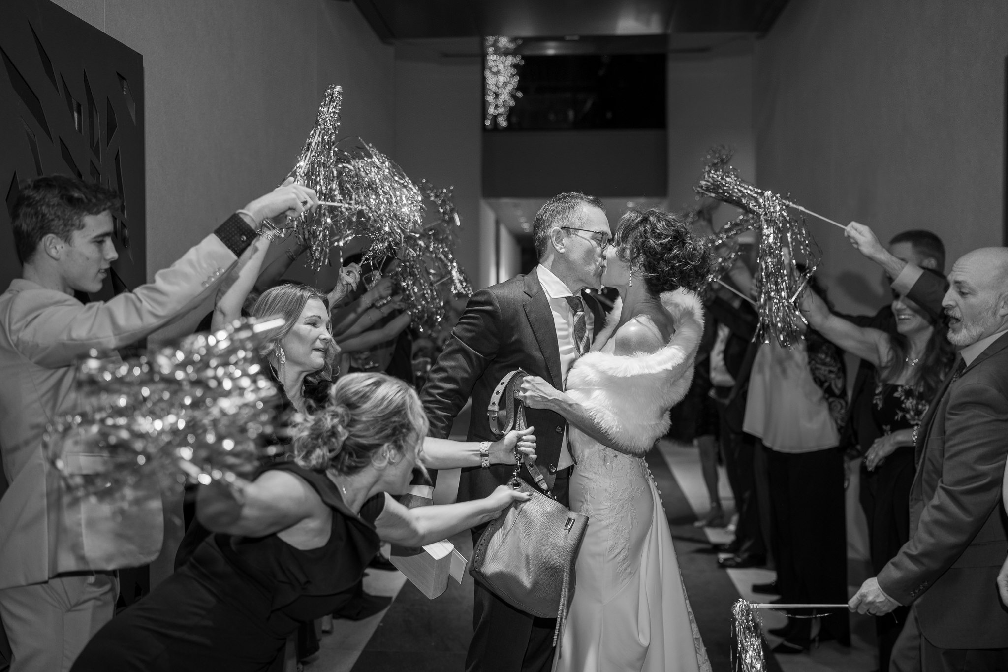 Celebrating a joyful wedding kiss.jpg