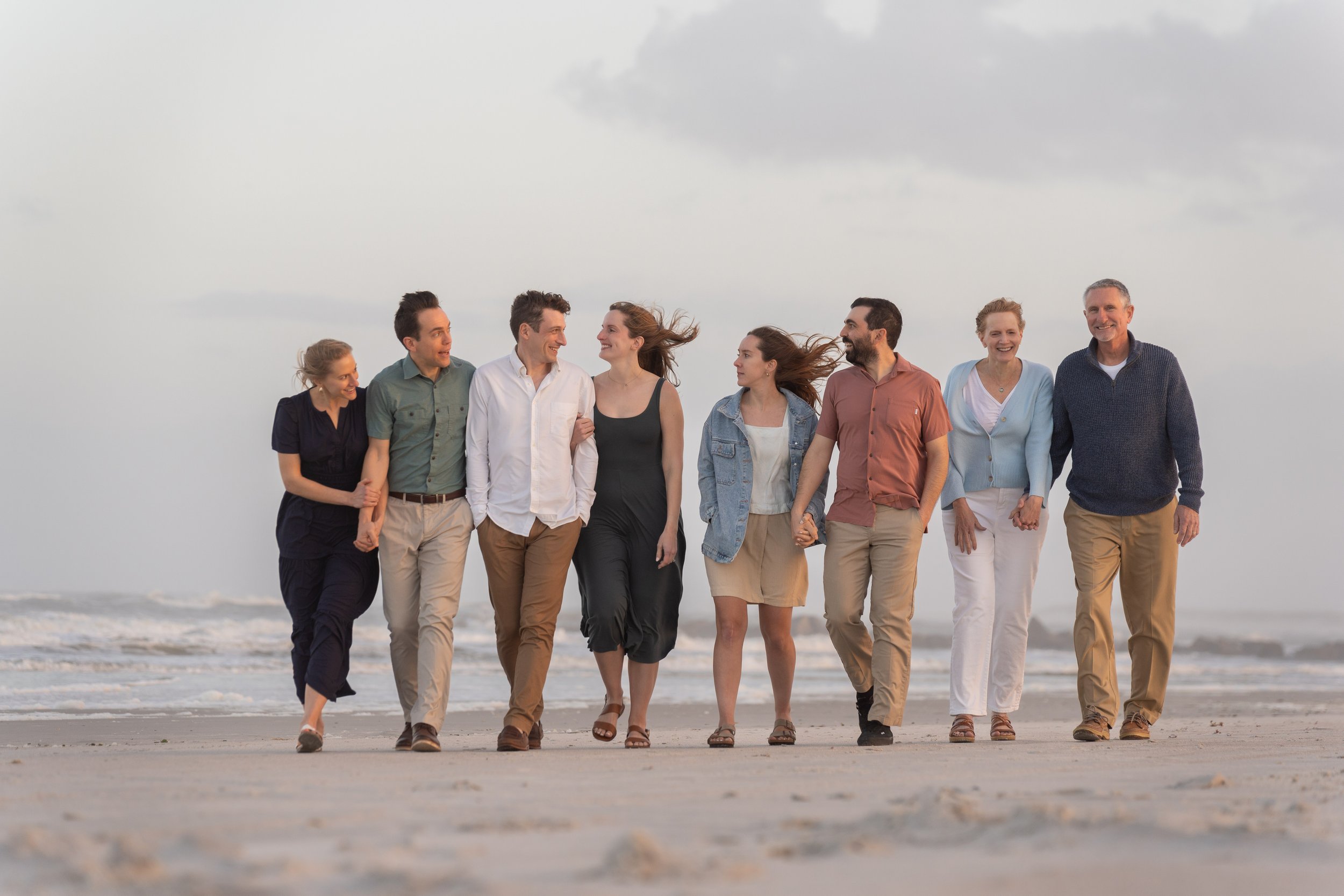 Friends walking on the beach.jpg